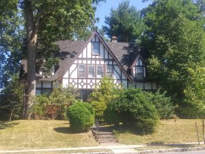 Tudor style home in suburban setting